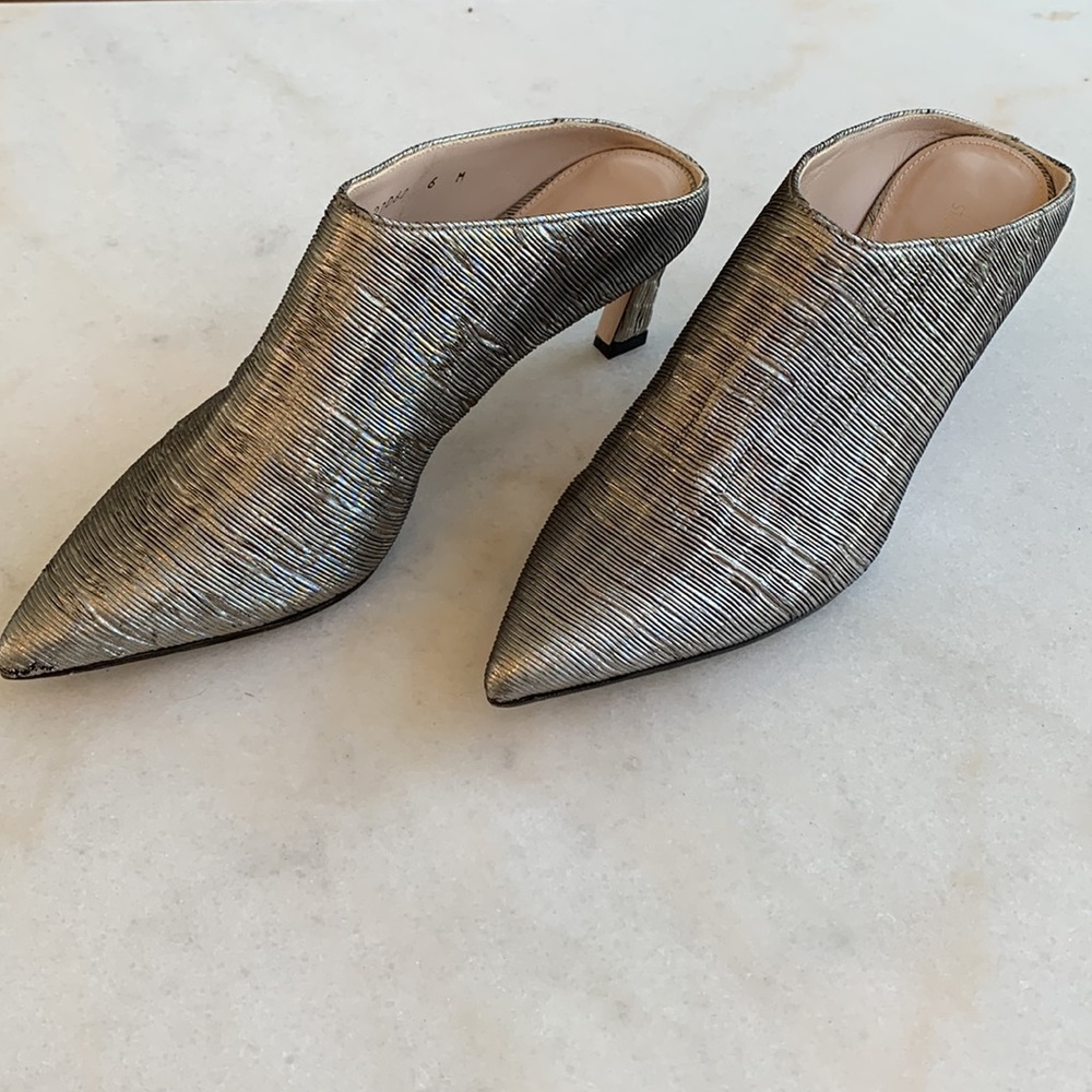 Stuart Weitzman size 6 silver mules with kitten heel.